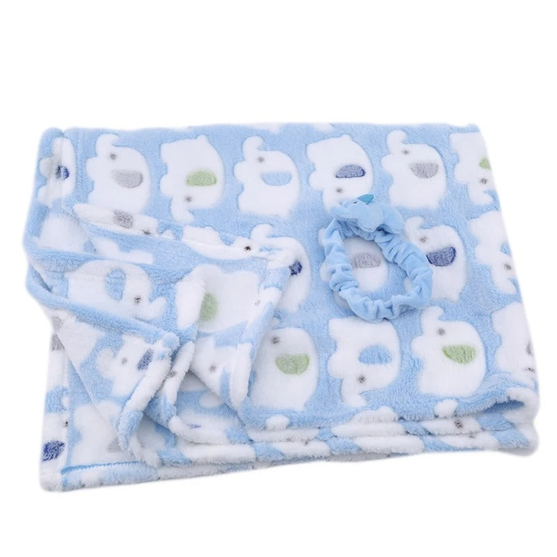 couverture bebe bleue plie avec elephants